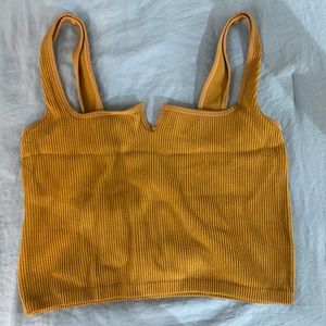 Ribbed, stretchy cropped tank top. One size. Fits XS-M.